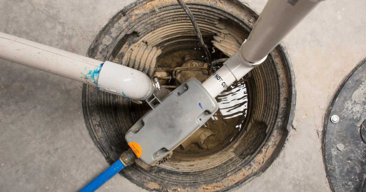 sump pump service being executed by a professional of Top Couse Masonry