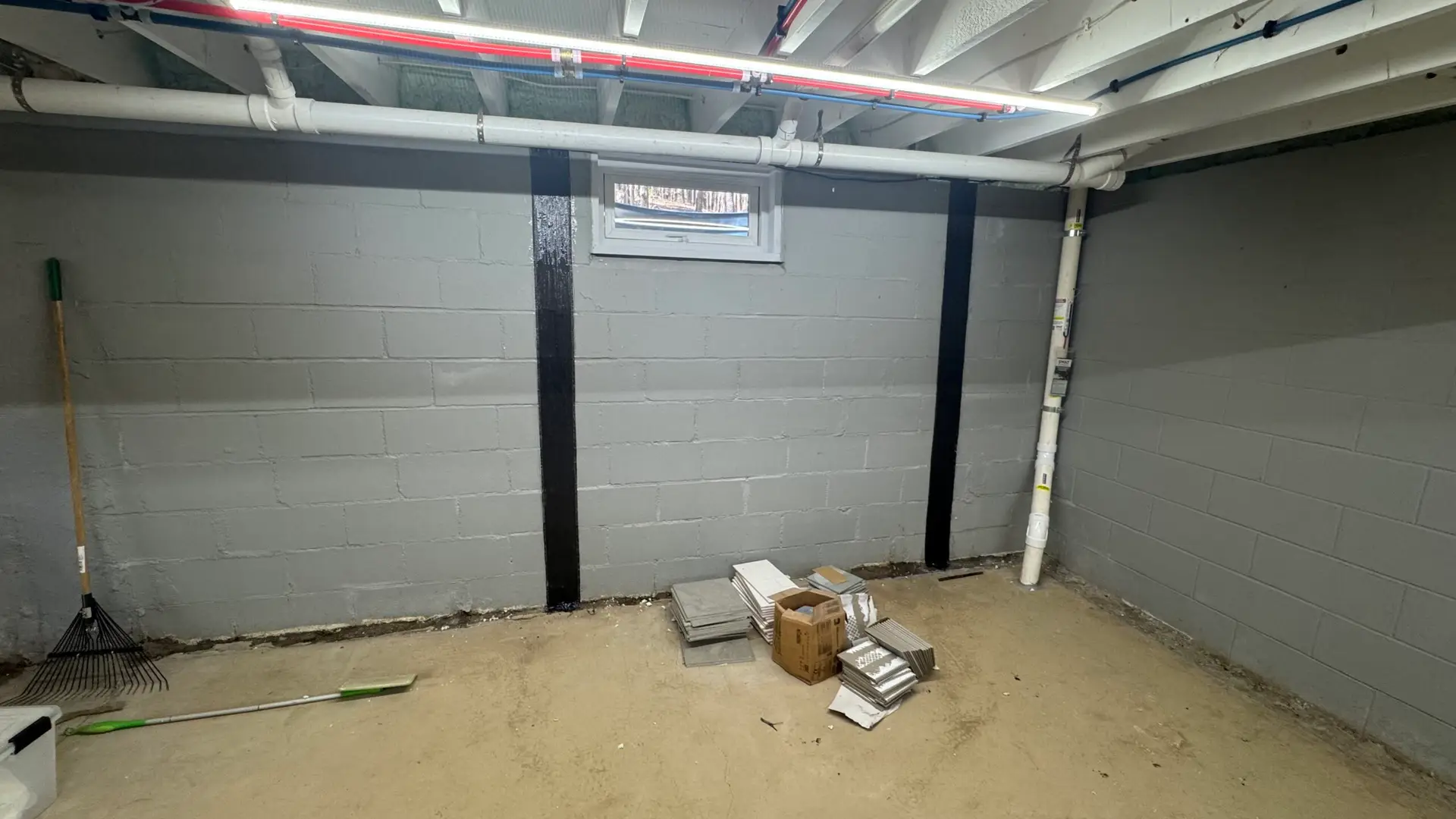 Basement interior after a waterproofing service done by Top Course Masonry