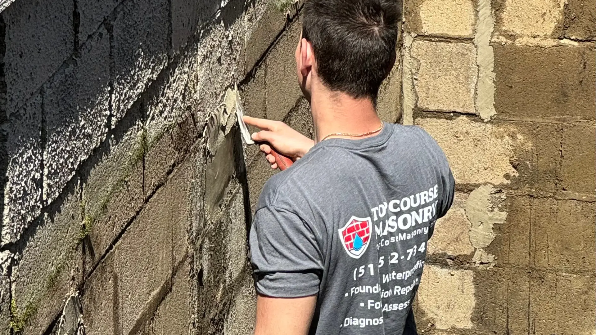 Top course masonry expert repairing the concrete before a waterproofing service